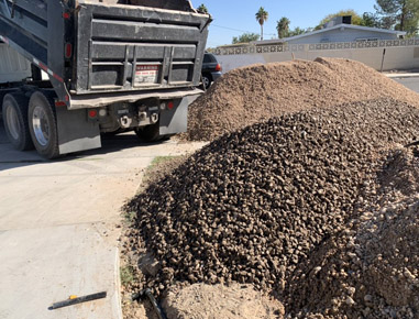 Landscape soil, rocks, flagstones, decorative boulders
